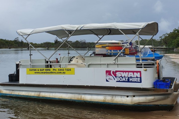 a small boat in a large body of water