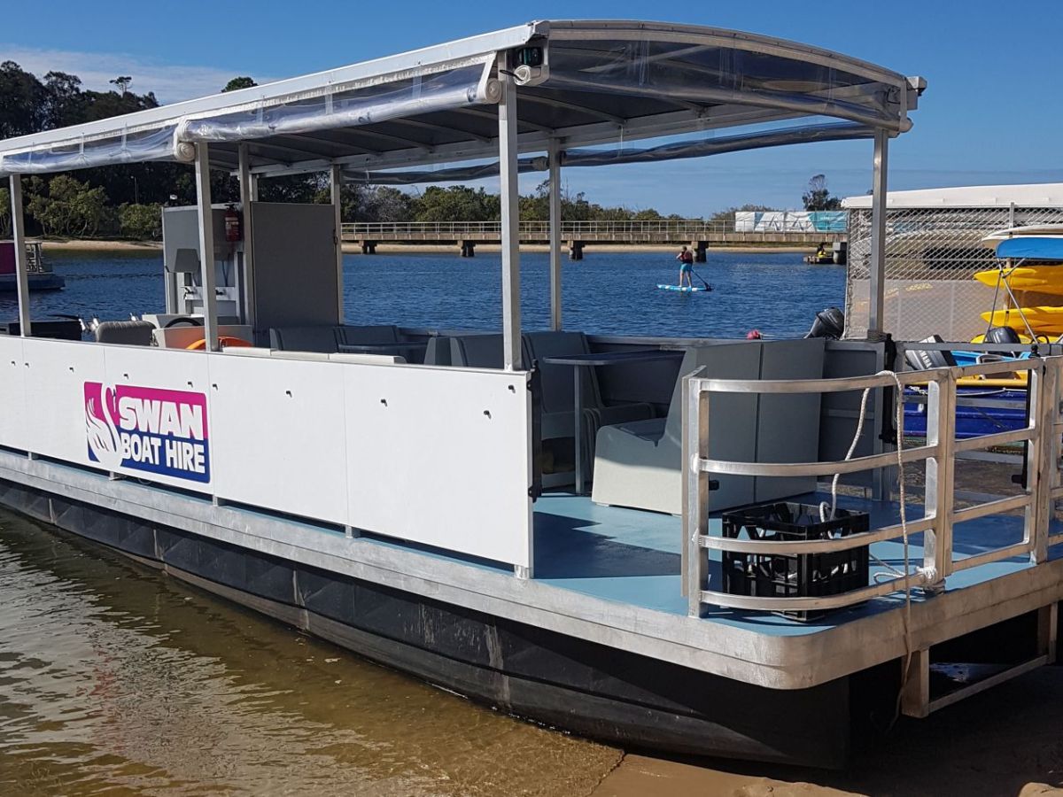 a boat docked at a dock