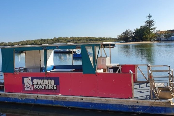 a small boat in a body of water