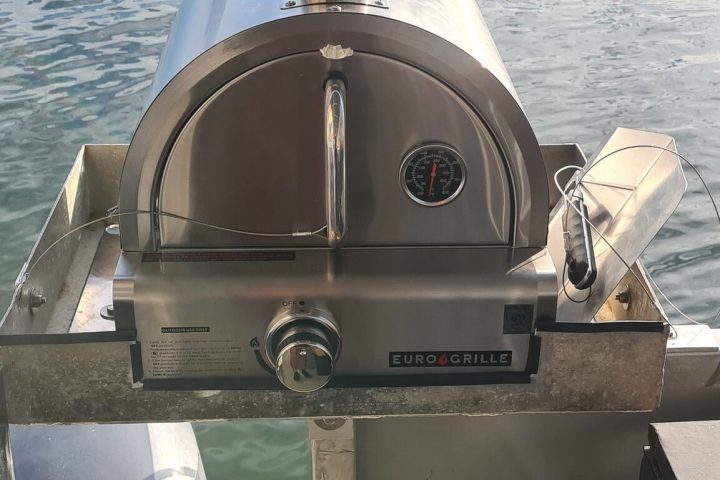 a boat parked next to a body of water