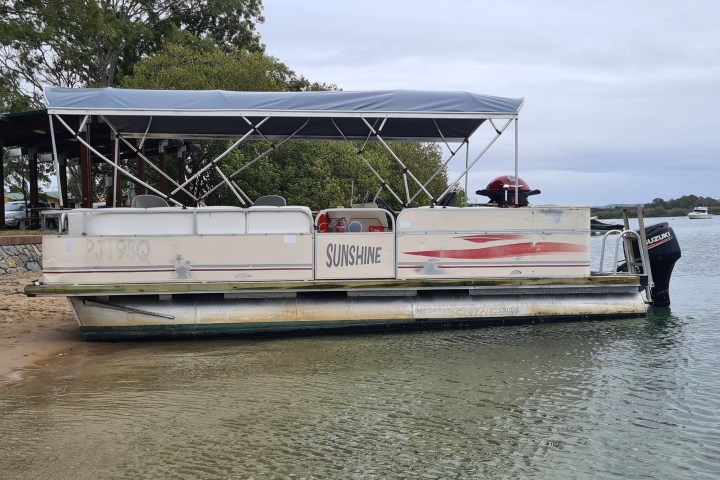 a small boat in a body of water