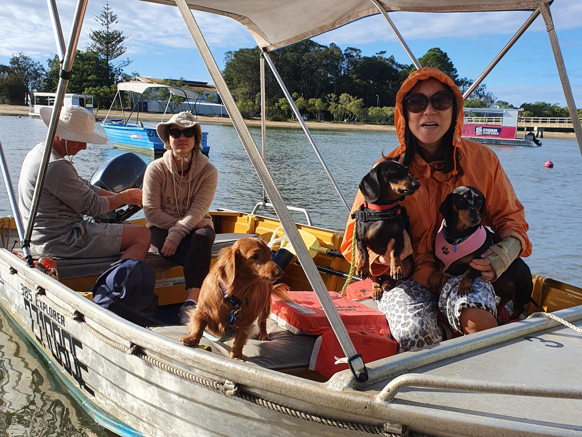 a group of people on a boat in the water