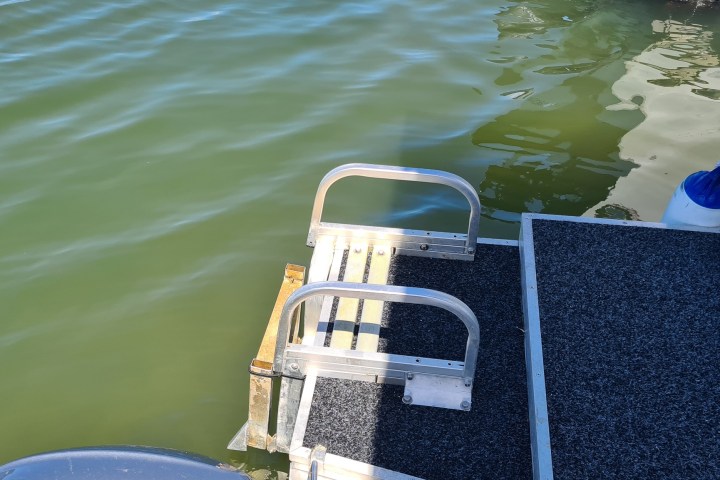 a small boat in a body of water