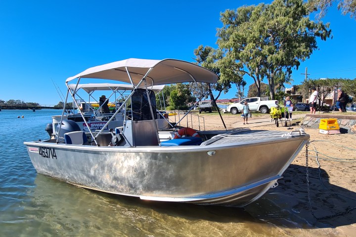 a small boat in a body of water