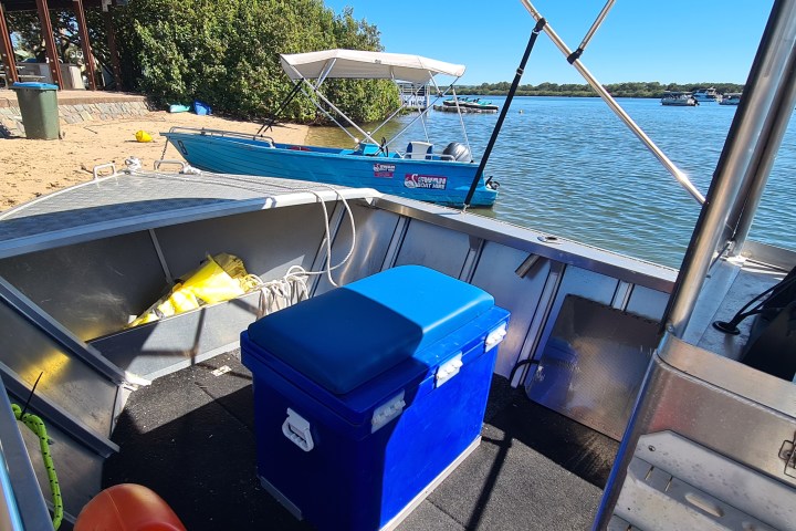 a boat sitting on top of a chair